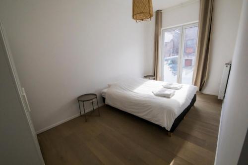 Postel nebo postele na pokoji v ubytování TravelEase - Midi