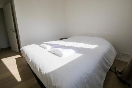 Postel nebo postele na pokoji v ubytování TravelEase - Midi