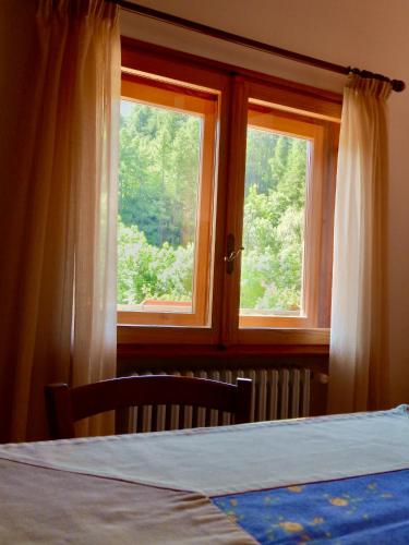Ένα ή περισσότερα κρεβάτια σε δωμάτιο στο Casa Vacanze Elisa