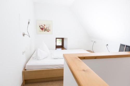 Postel nebo postele na pokoji v ubytování Hotel Klostergasthof
