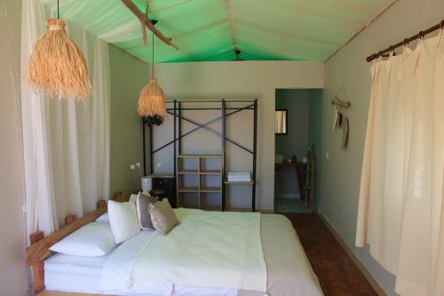 Letto o letti in una camera di Veranda Glamping