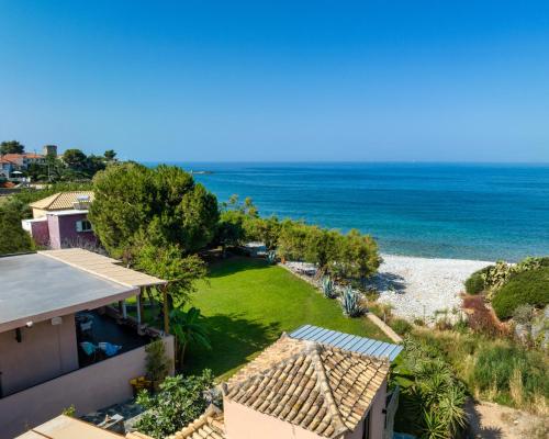 an aerial view of a house and the ocean at Malsova Maisonette in Kotrónion