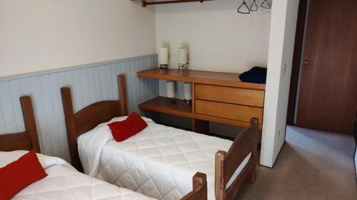 Katil atau katil-katil dalam bilik di Apartamento Capivari