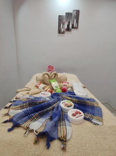 a pile of blankets and food on a bed at The Golden Pera's Hotel & Spa in Istanbul