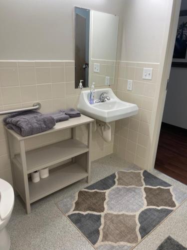 a bathroom with a sink and a toilet at Beautiful Beginnings at Bayside in Crystal River