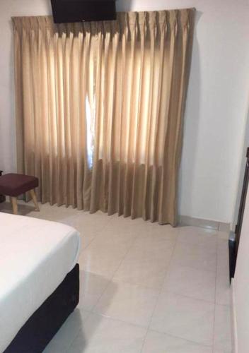Ένα ή περισσότερα κρεβάτια σε δωμάτιο στο The Branch B&B