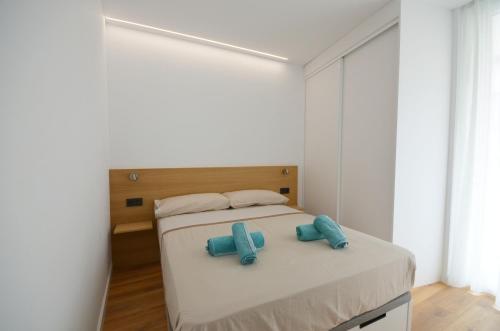Katil atau katil-katil dalam bilik di Suites Port Cambrils