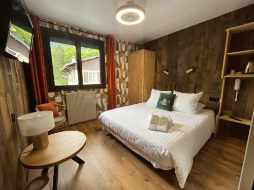 Postel nebo postele na pokoji v ubytování Hôtel La Rencluse