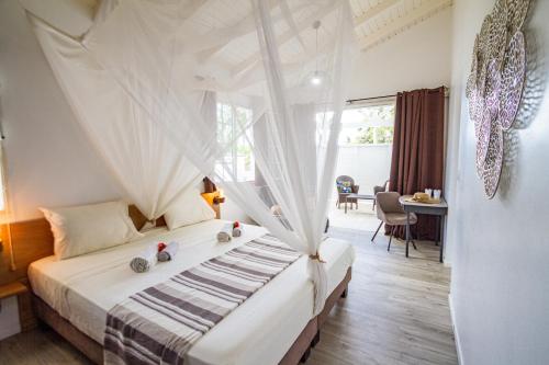 Postel nebo postele na pokoji v ubytování Villa avec piscine privée à 5 minutes de la plage!