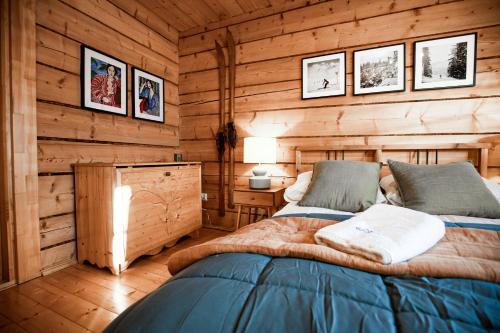 Un pat sau paturi într-o cameră la VisitZakopane - Ski House