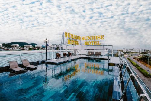 a swimming pool on top of a cruise ship at SUNRISE Hotel HA TIEN in Ha Tien