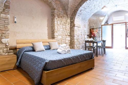 Postelja oz. postelje v sobi nastanitve Loft nel cuore di Assisi - 50 mt da Carlo Acutis