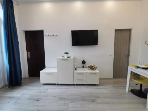 Μια τηλεόραση ή/και κέντρο ψυχαγωγίας στο Iris's apartament