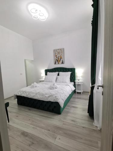 Ένα ή περισσότερα κρεβάτια σε δωμάτιο στο Iris's apartament