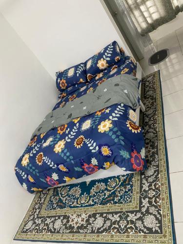 Katil atau katil-katil dalam bilik di Homestay D’Bella