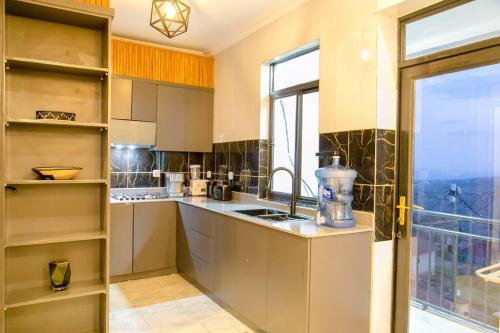 Una cocina o zona de cocina en Nzuri Nest Keza