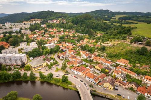 an aerial view of a town next to a river at Penzion Golden Crown in Český Krumlov