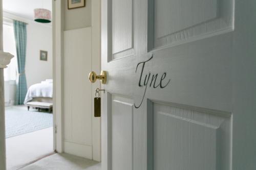 Katil atau katil-katil dalam bilik di Stay On The Hill - The Coach House