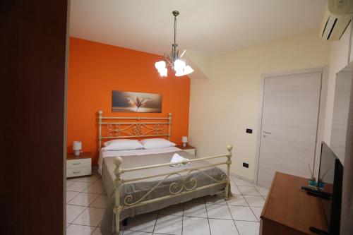 Łóżko lub łóżka w pokoju w obiekcie La casa di Bella