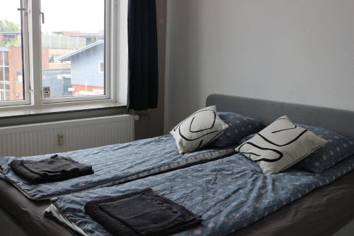 Een bed of bedden in een kamer bij Joey nest