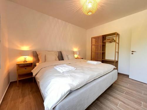 Postel nebo postele na pokoji v ubytování Apartmány Mušlov