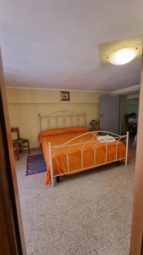Ένα ή περισσότερα κρεβάτια σε δωμάτιο στο Casa Sybaris 20 mt dalla Stazione 1 piano