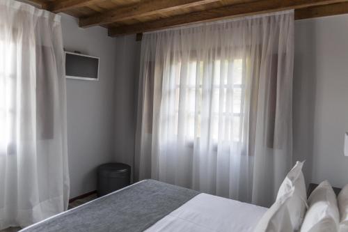 Postel nebo postele na pokoji v ubytování Don Pablo
