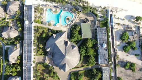 an overhead view of a park with buildings and a sign at Twiga Beach Resort in Watamu