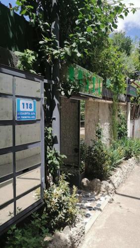 an entrance to a building with a sign on it at Kai Hotel Bar in Tbilisi City