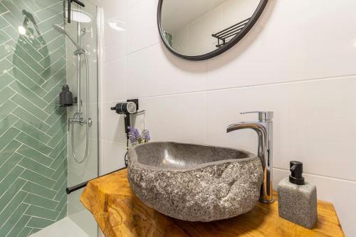 Et badeværelse på Apartamento Boutique Kala Ático