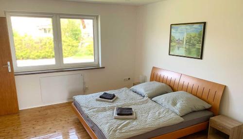 Cama o camas de una habitación en Ferienhaus Liebchen free Netflix