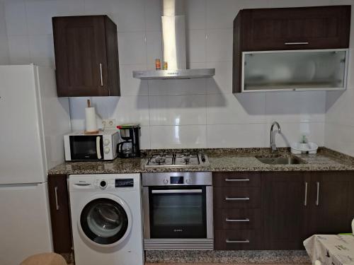 Dapur atau dapur kecil di CA Apartamentos Pampin Ponte do Porto