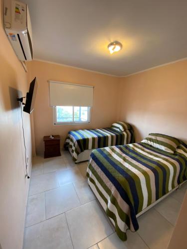 Un pat sau paturi într-o cameră la JoseMariaPaz