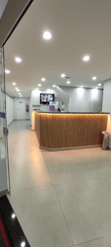 Lobi atau kawasan kaunter penerimaan di Jaguaré Hotel