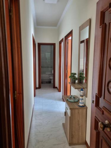 a corridor of a room with a hallway at Casa Malteses in A Guarda