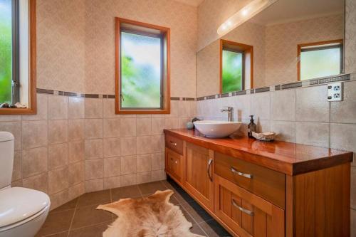 Ett badrum på Luxury Country retreat