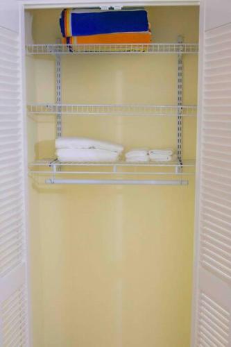 a bathroom with a towel rack with towels at Villa Paradiso in Richmond