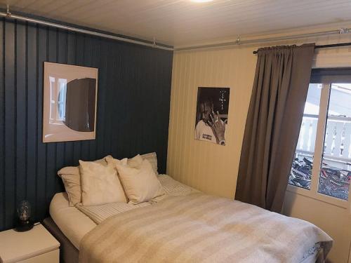 Posteľ alebo postele v izbe v ubytovaní Leilighet i sentrum av Trondheim - Leies ut under AQUA NOR 2023 UTSTILLINGEN