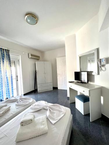 Postel nebo postele na pokoji v ubytování Atrium Apartment #3