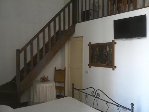 A television and/or entertainment centre at B&B Palazzo Antonelli