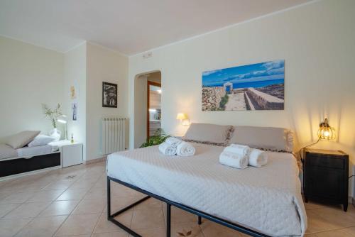 Postel nebo postele na pokoji v ubytování B&b Dea Teti