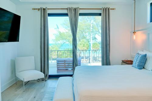 Giường trong phòng chung tại Gulf View Estate