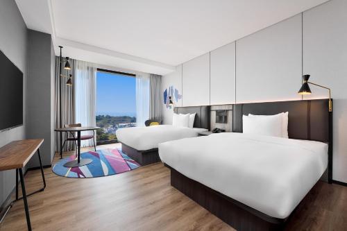 Aloft Tainan Anpingにあるベッド