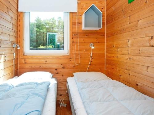 Katil atau katil-katil dalam bilik di 8 person holiday home in Hemmet-By Traum