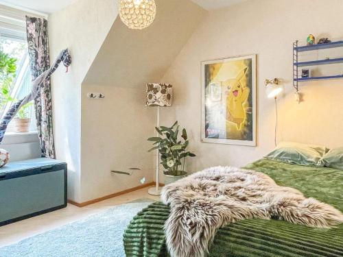 Postel nebo postele na pokoji v ubytování 4 person holiday home in Västervik