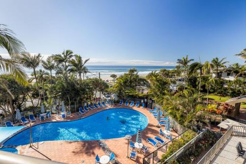 an aerial view of the pool and beach at a resort at The Rocks Resort Unit 3C in Gold Coast