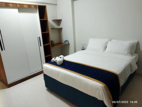 Cama o camas de una habitación en Apartel by Aarin - Oragadam
