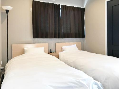 Cama ou camas em um quarto em PIKAICHI Privatestay series AO Earth - Vacation STAY 98455v
