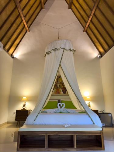 Letto o letti in una camera di Green Coco Suite