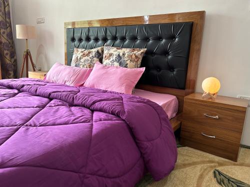 Una cama o camas en una habitación de Nature Palace Farmstay